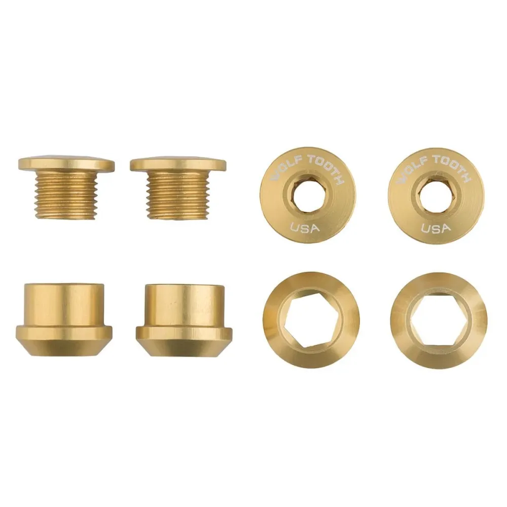 Sats med 4 st M8x6 mm WOLF TOOTH Transmission 1X Gold skorstensmuttrar och -skruvar
